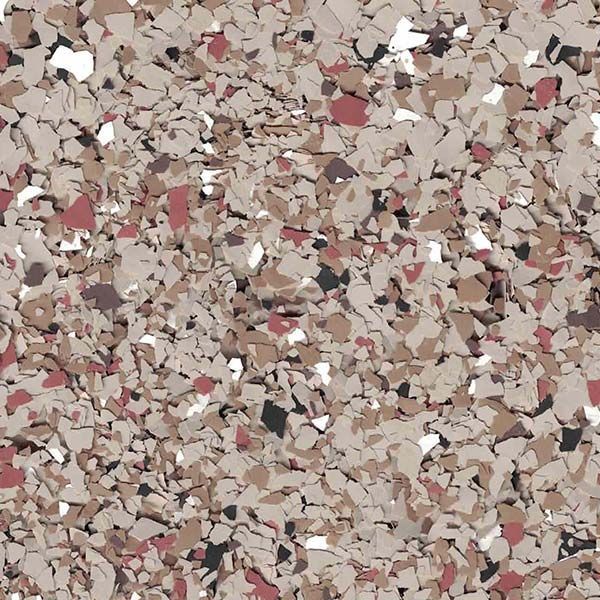 Close-up of a speckled tan, cream, and brown textured surface