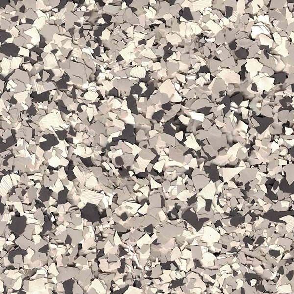 Close-up of a gray, beige, and white speckled stone or terrazzo surface.