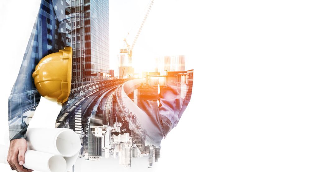 A double exposure of a construction worker holding a hard hat and blueprints.