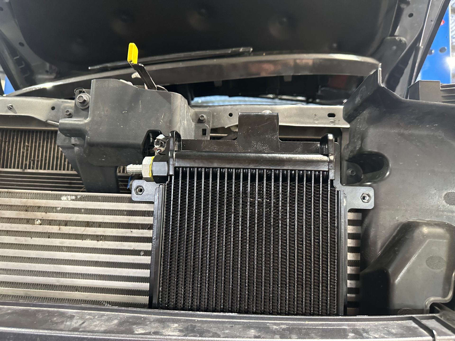 A close up of a dirty air filter in a car.