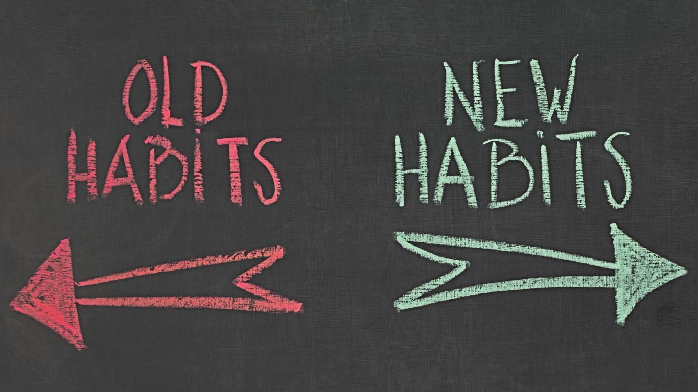 Chalkboard text “OLD HABITS” with a red left arrow and “NEW HABITS” with a green right arrow.