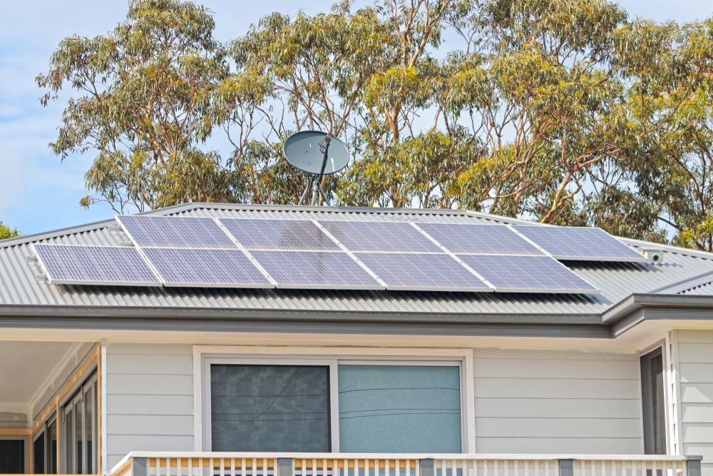 Electric Solar Panels Install On A Roof And Satellite Dish — Entire Trades in Port Stephens, NSW
