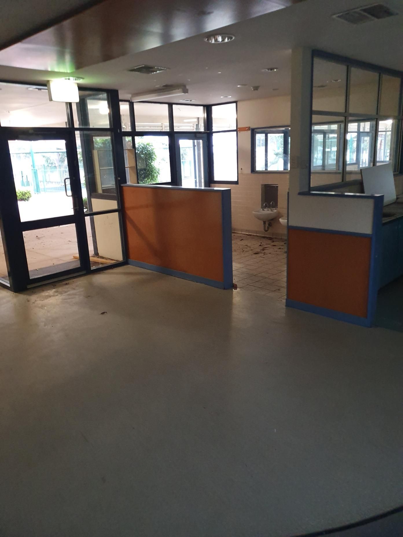 A Large Empty Room with A Lot of Windows and Dividers — Entire Trades in Singleton, NSW