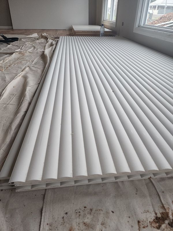 An Interior Space With White Sheets Laid Out On The Floor — Entire Trades in Cessnock, NSW