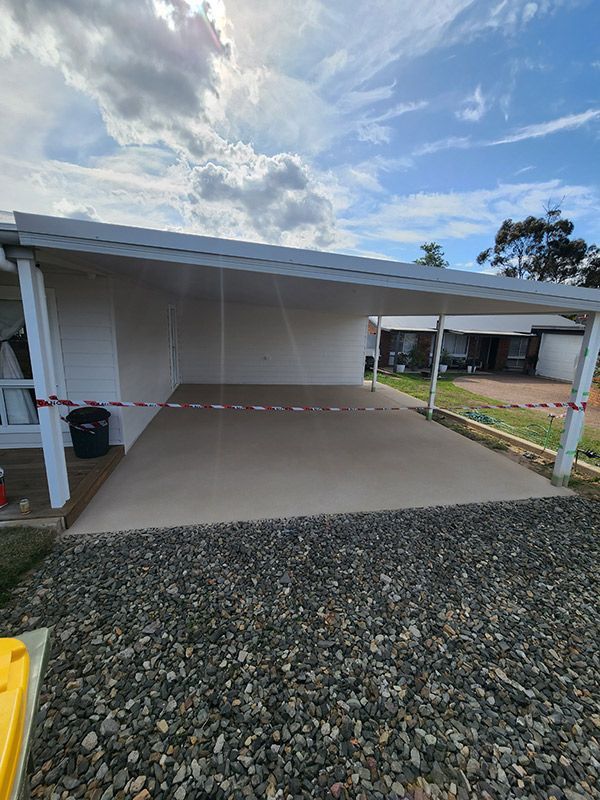  A Carport With A White Roof And Fence Shown — Entire Trades in Port Stephens, NSW