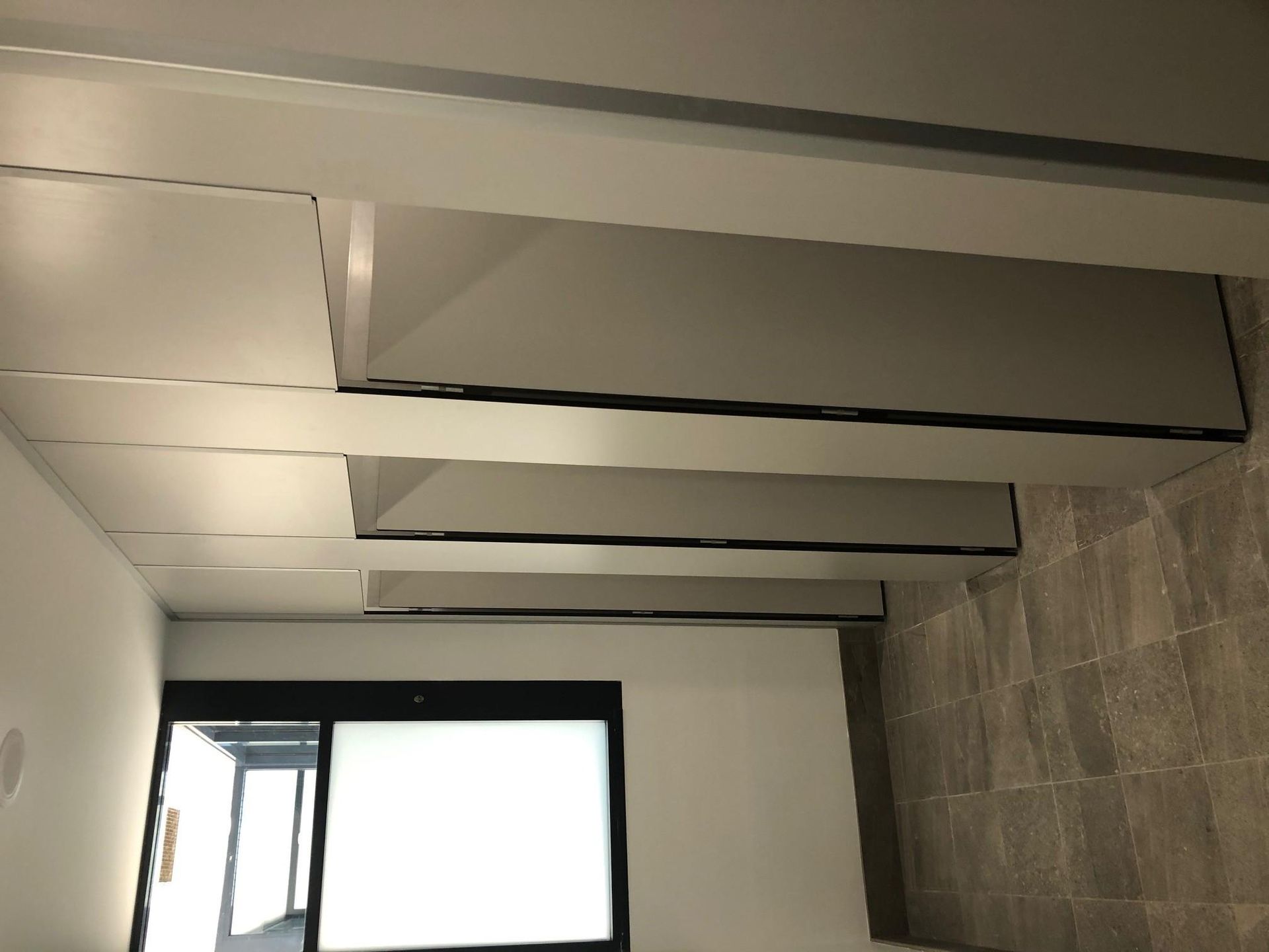 A Room with White Walls and A Black Window — Entire Trades in Maitland, NSW