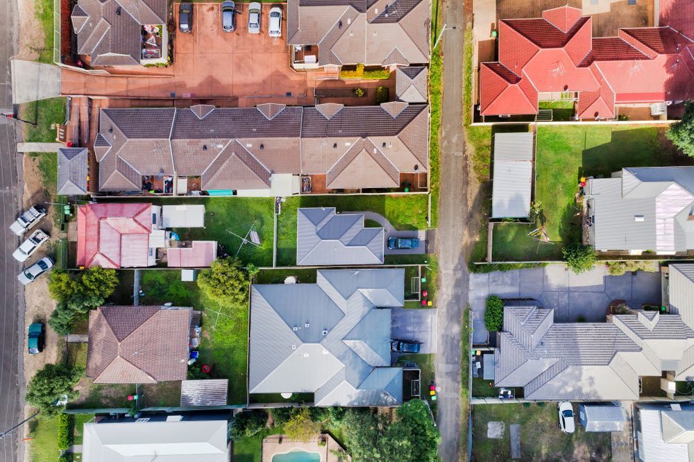 Roof Tops And Yards Of Residential Homes In Cessnock — Entire Trades in Cessnock, NSW