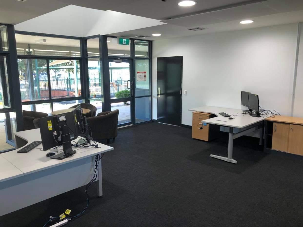 A Room with A Desk and A Computer in It — Entire Trades in Maitland, NSW