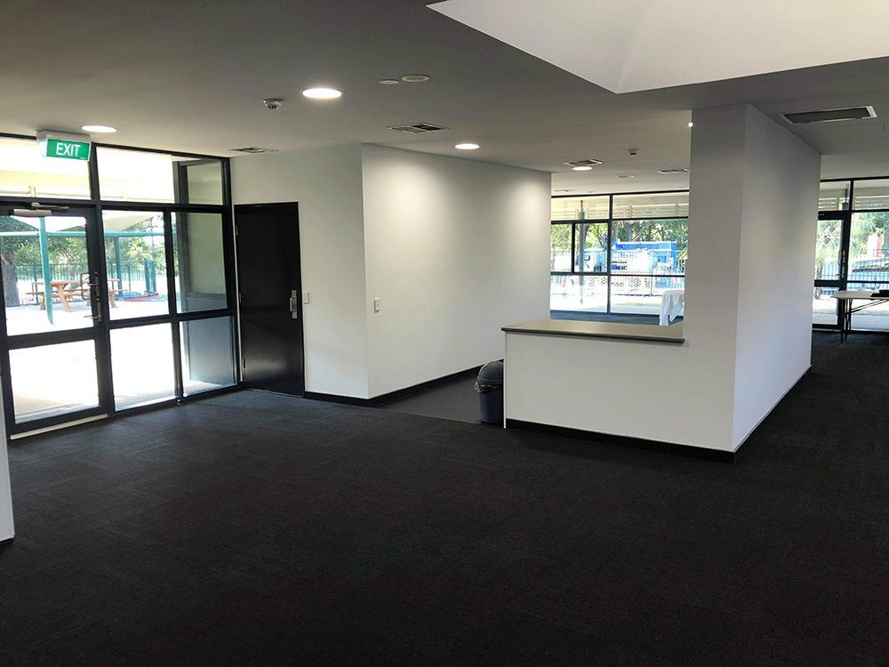 Empty Room With Lots Of Windows And Lights — Entire Trades in Singleton, NSW