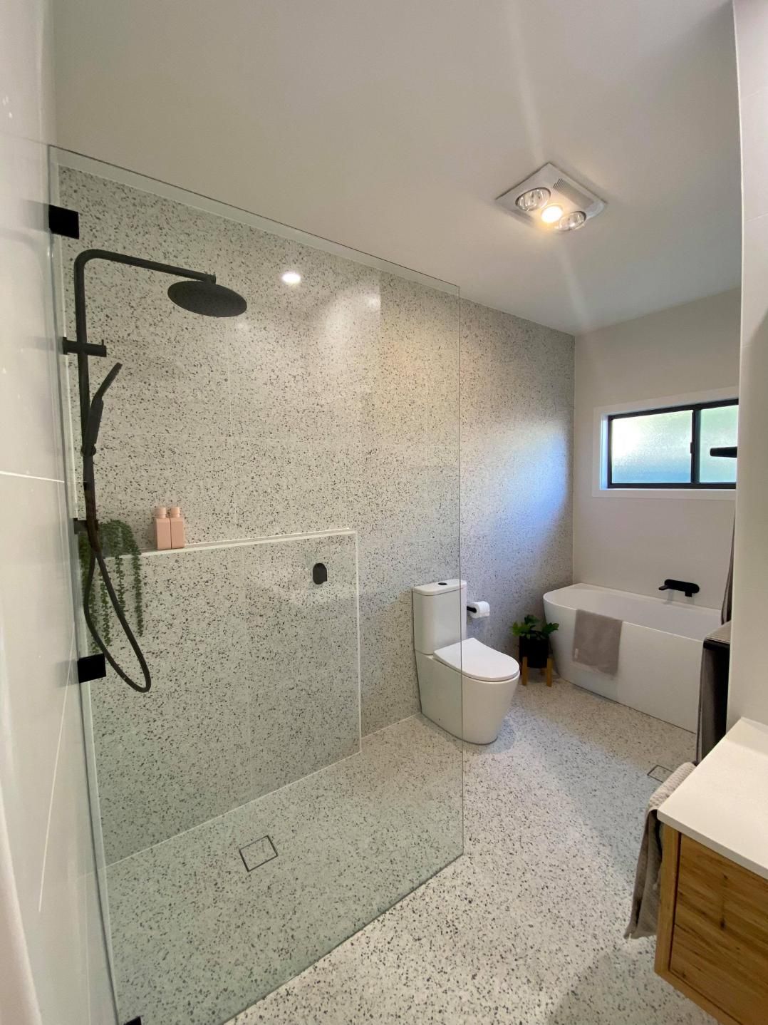 A Bathroom with A Walk in Shower , Toilet and Bathtub — Entire Trades in Maitland, NSW