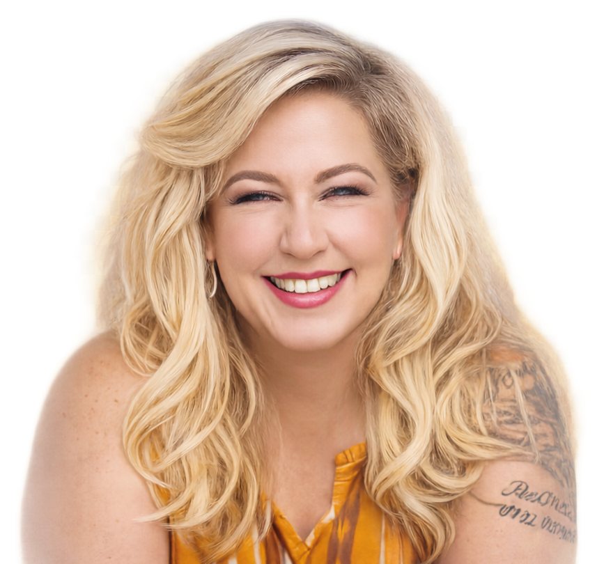 Blonde woman with a bright smile, wearing a yellow top, arm tattoo visible, studio setting.