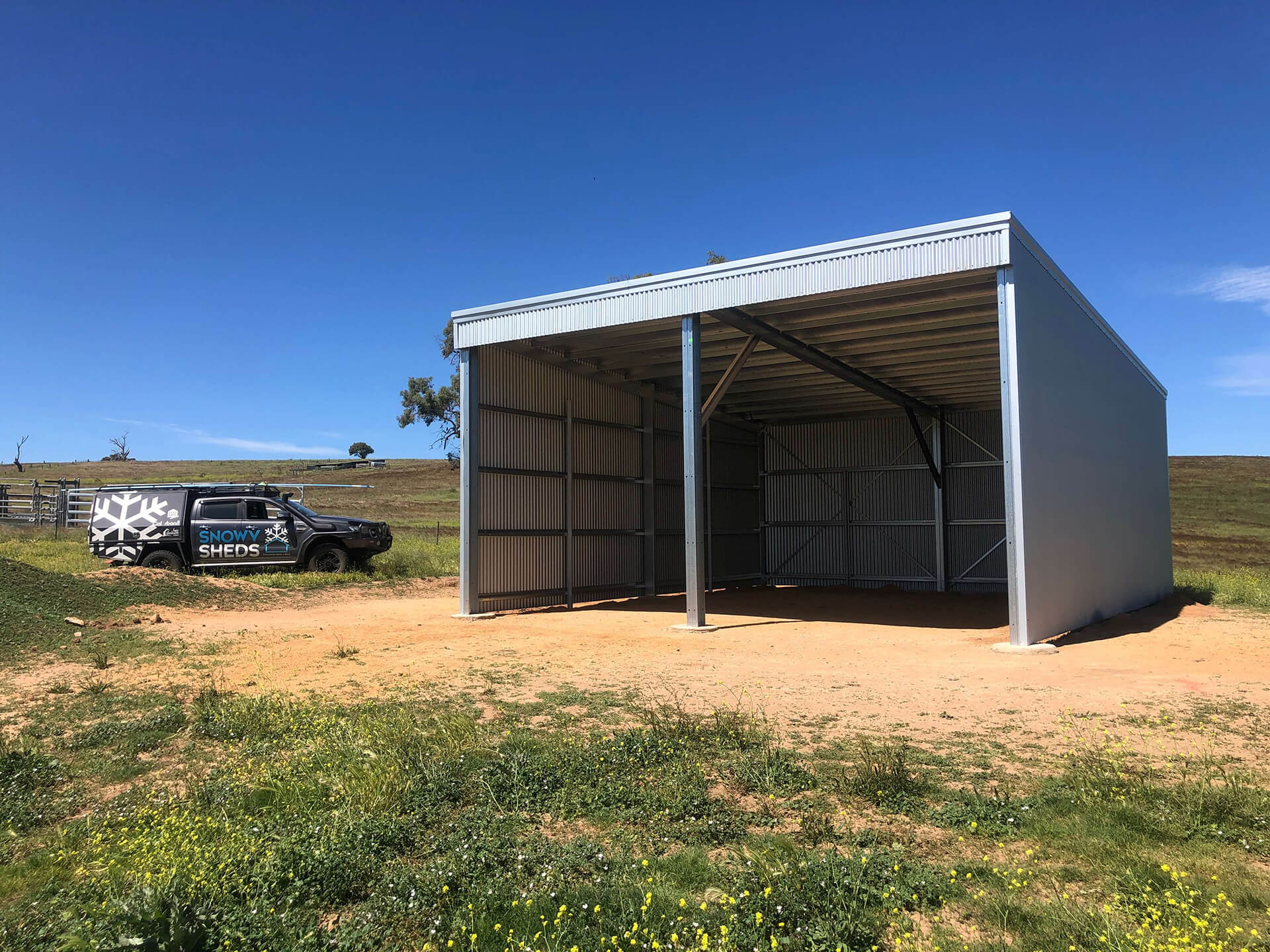 Flat roof Carport attached to house - Snowy Sheds