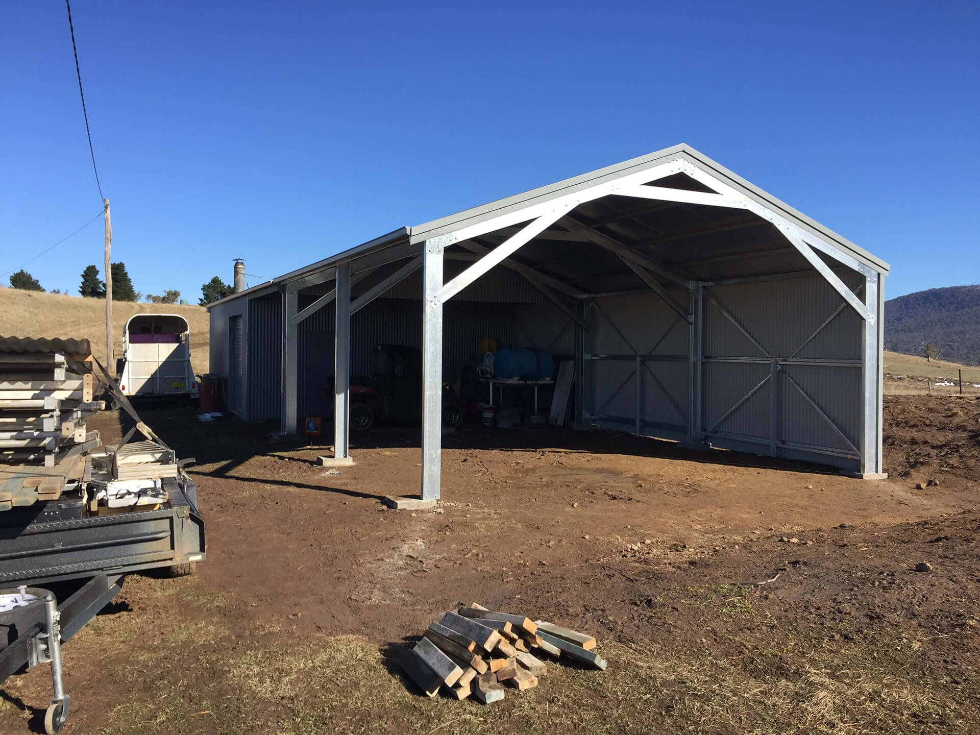 Flat roof Carport attached to house - Snowy Sheds