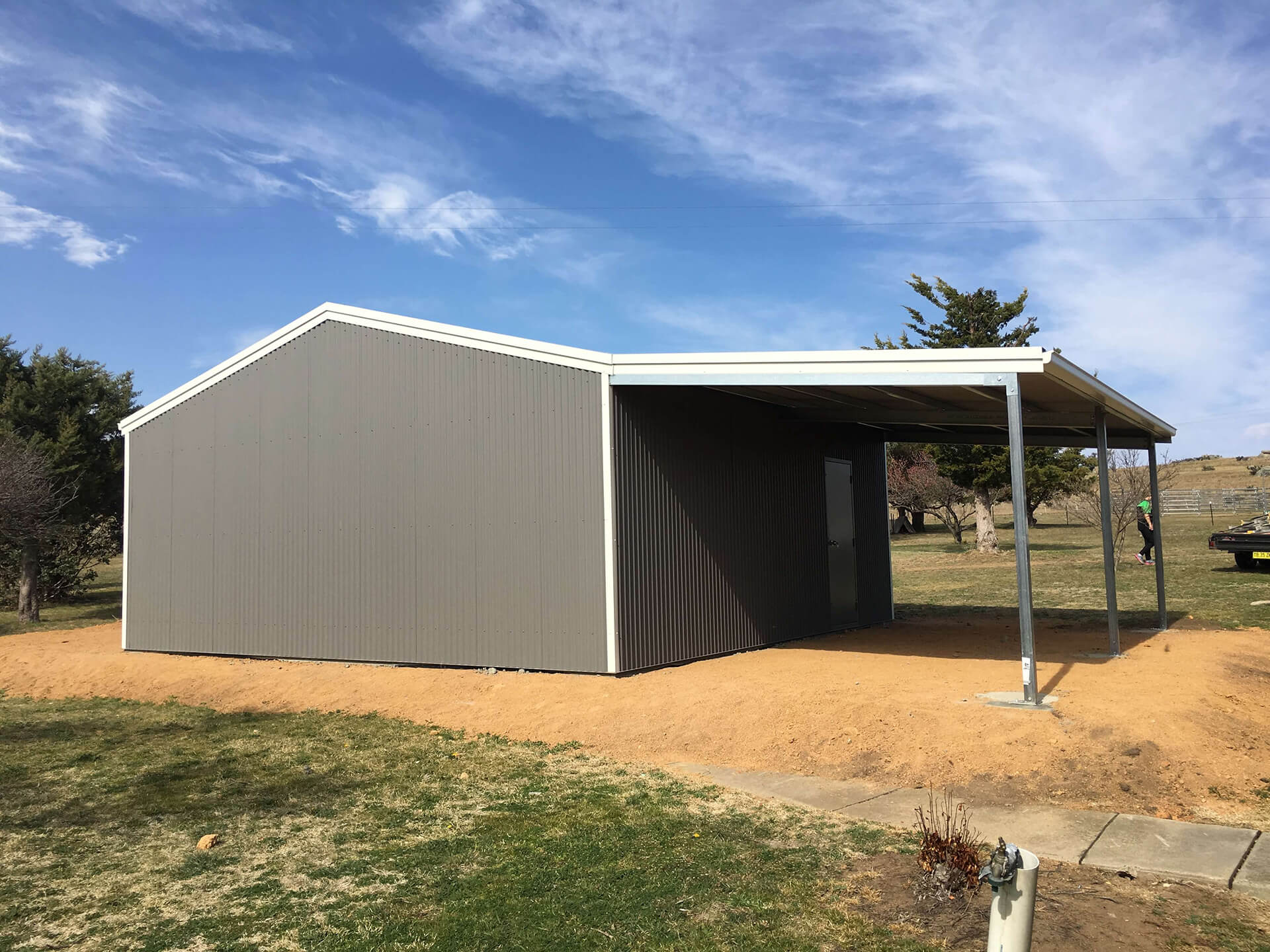 Flat roof Carport attached to house - Snowy Sheds