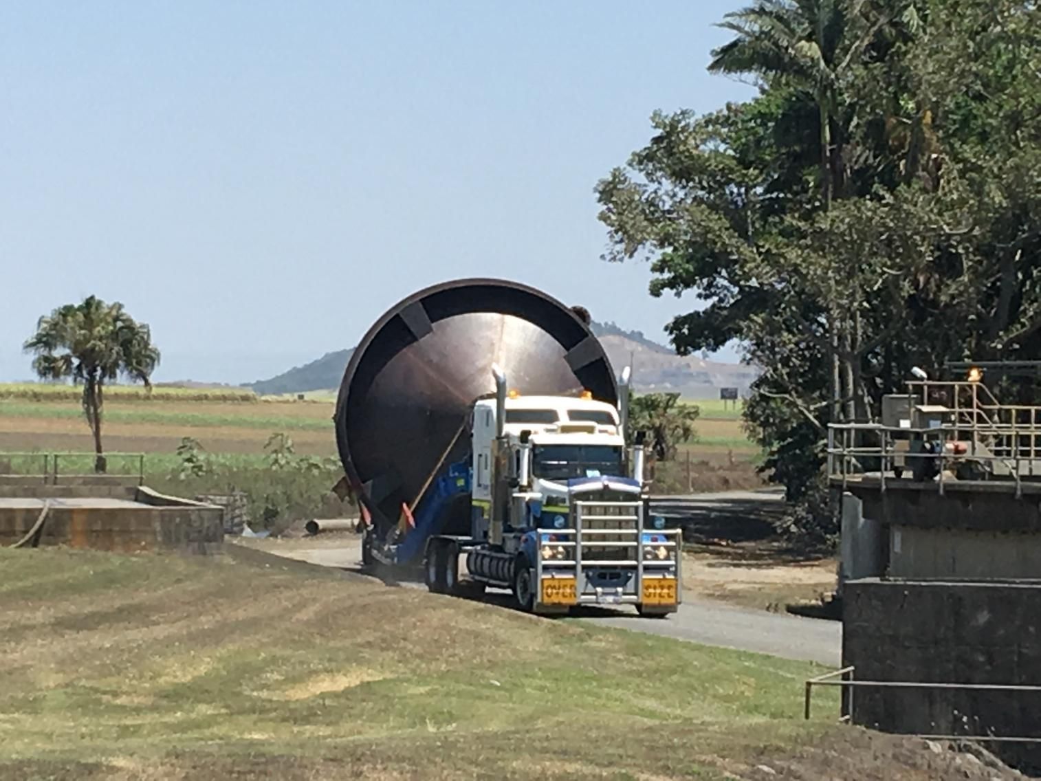 A Large Metal Conical Structure on a Flatbed Truck — Col Adamson Transport Services in Farleigh, QLD