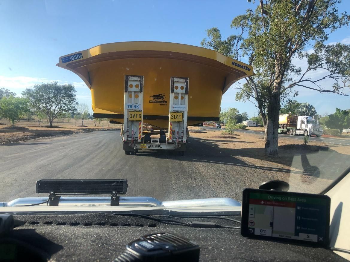 Yellow Industrial Component on a Truck Traveling on a Rural Road — Col Adamson Transport Services in Farleigh, QLD
