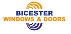 Bicester Windows & Doors logo in blue and orange with a circular abstract design