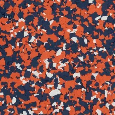 A pattern of small, irregularly shaped vinyl flakes in orange, dark blue, and white, typically used for floor coatings.
