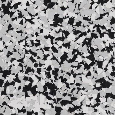 A speckled, high-contrast floor pattern with overlapping black, white, and gray geometric flakes.