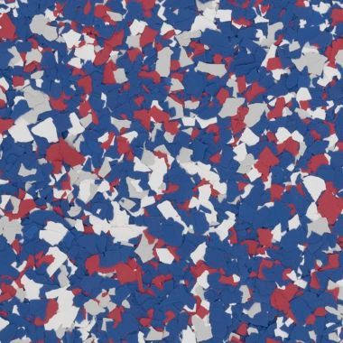 A dense, multi-colored pattern of small red, white, and blue vinyl decorative chips for epoxy flooring.