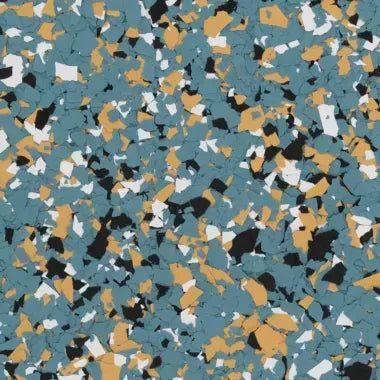Decorative epoxy floor coating with a speckled pattern of blue, tan, white, and black flakes.