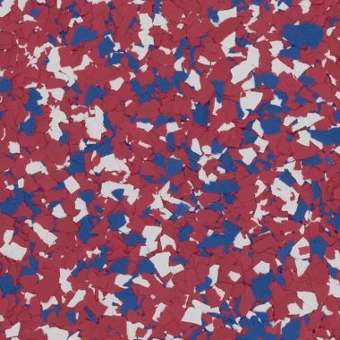 A speckled, multi-colored flooring surface with an even mix of small red, white, and blue vinyl chips.