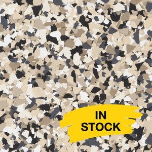 A pattern of beige, white, and dark gray speckled vinyl floor chips with a yellow 