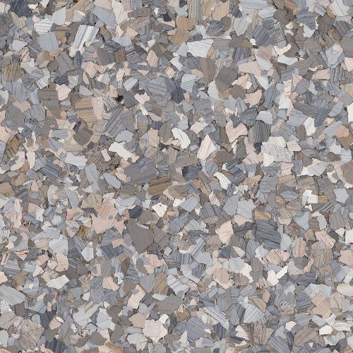 A textured pattern of multi-colored paint chips in shades of grey, taupe, white, and brown, commonly used for flooring.