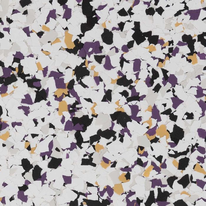 Decorative vinyl floor flakes in a mix of white, black, purple, and tan fragments.