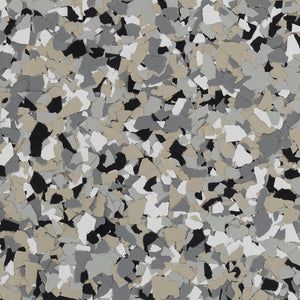 A speckled texture of vinyl paint flakes in shades of grey, black, white, and tan.