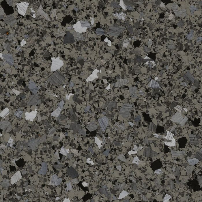A speckled floor coating texture featuring a gray base with mixed black, white, and gray flakes.