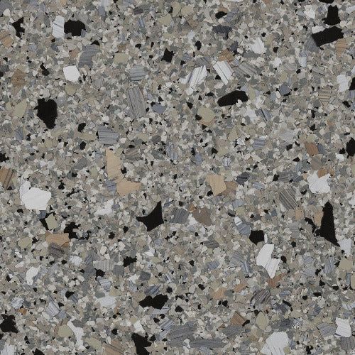 Granite-like flooring pattern with flecks of black, white, gray, and tan.