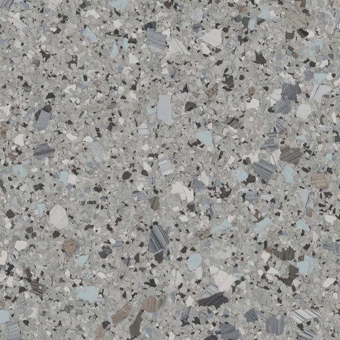A close-up texture of gray, white, and black flecked vinyl flooring or granite-style epoxy coating.