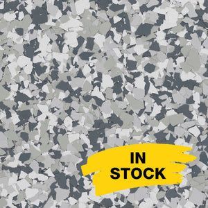A background pattern of grey, white, and black paint flakes for flooring, with a yellow 