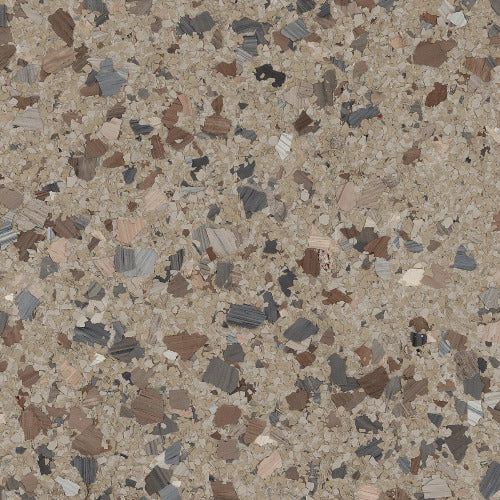 A beige epoxy floor coating featuring a speckled pattern of brown, gray, and tan vinyl flakes.