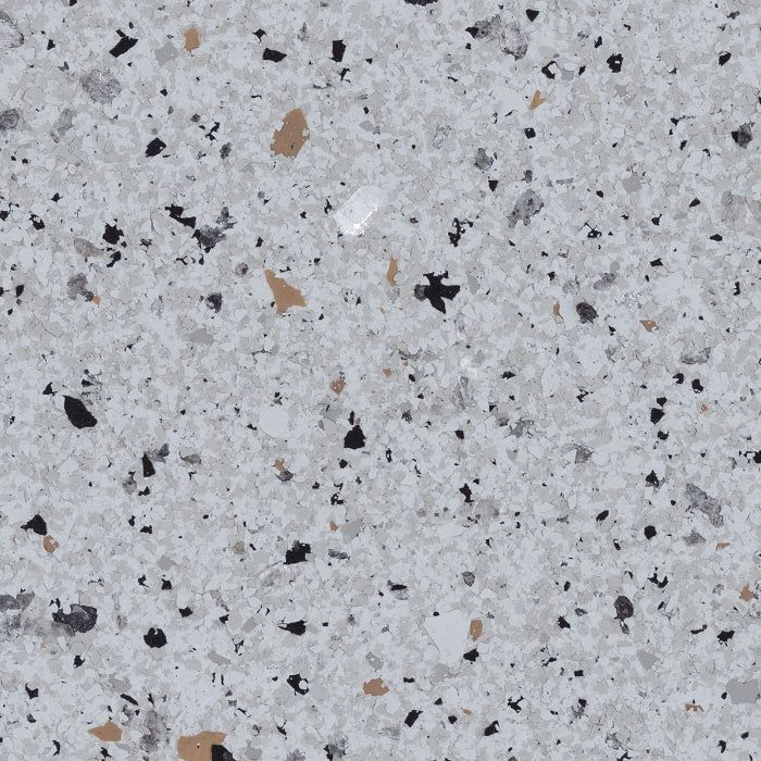 A speckled, light gray background with small, irregular flecks in black, dark gray, and tan.