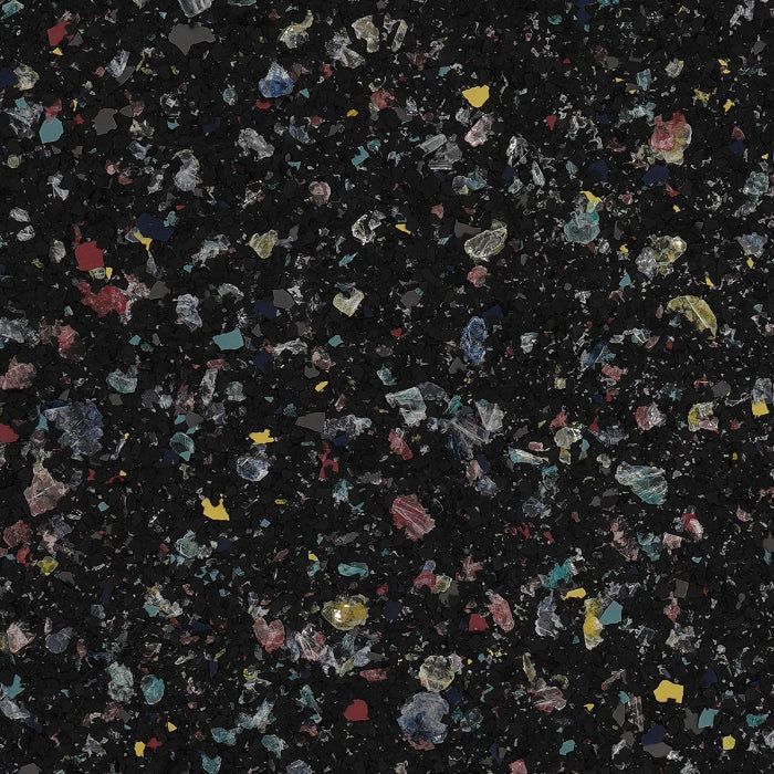 A black background patterned with small, irregular flecks of yellow, blue, red, and white, resembling a terrazzo surface.