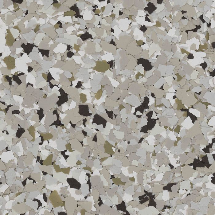 A seamless texture of decorative paint chips in shades of beige, gray, white, and black for flooring.