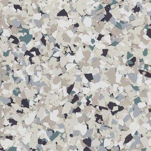 A textured pattern of multi-colored vinyl flakes in shades of beige, light gray, dark charcoal, and muted blue-green.