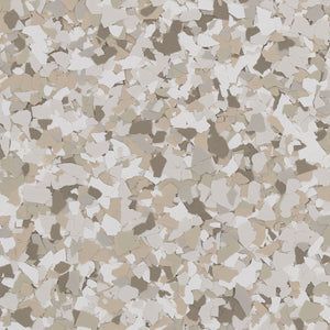 A close-up view of epoxy flooring material with a multi-toned, speckled pattern in shades of white, beige, and light brown.