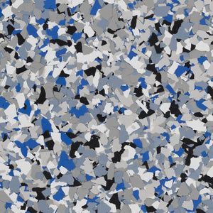 Decorative epoxy floor coating with a speckled pattern of blue, gray, black, and white vinyl chips.