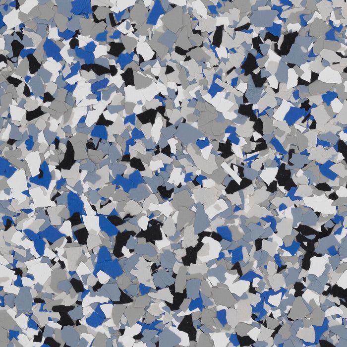 A decorative floor coating pattern featuring a dense blend of blue, gray, white, and black paint flakes.