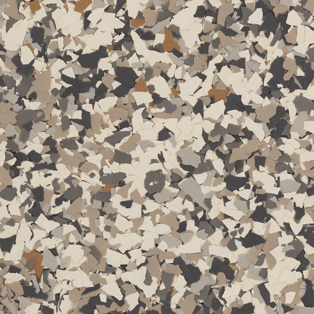 Decorative floor flake texture in a neutral color palette of beige, tan, dark gray, and white chips.