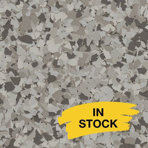 Grey and white speckled flake floor texture with a yellow 