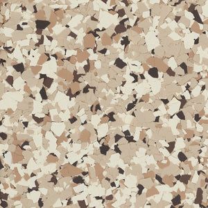 Textured flooring pattern featuring a mix of small, irregular chips in shades of tan, beige, cream, and dark brown.