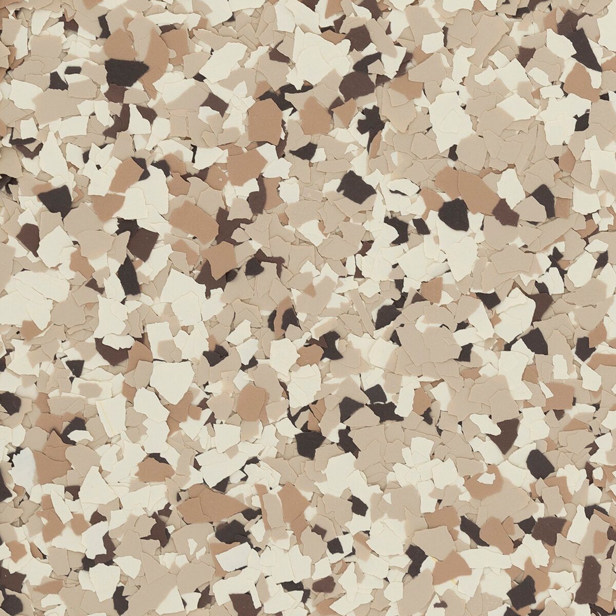 A close-up texture of decorative vinyl floor flakes in shades of beige, cream, white, and dark brown.