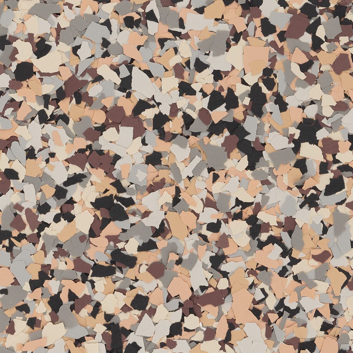 Decorative epoxy floor flake blend featuring a mottled pattern of black, grey, tan, and cream-colored flecks.