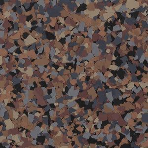 A mosaic of vinyl floor flakes in shades of tan, dark brown, black, and slate grey.