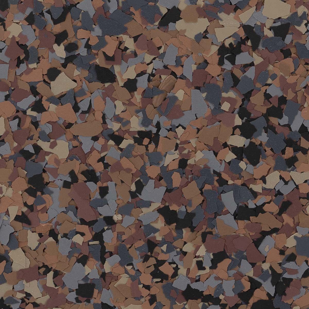 A textured pattern of multi-colored vinyl flakes in shades of brown, tan, gray, and black for epoxy floor coating.