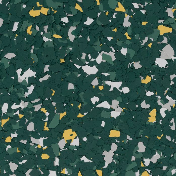 Textured flooring surface with a mix of dark green, light gray, and yellow-gold plastic flakes.